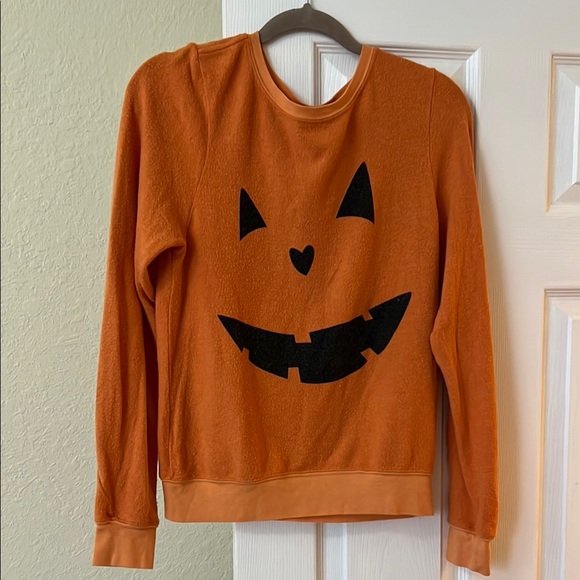Wildfox Sweaters - Wildfox Orange Crew Neck Sweater with Black Jack-o'-lantern Design